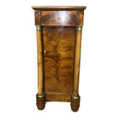 Empire period bedside table in walnut with detached columns.