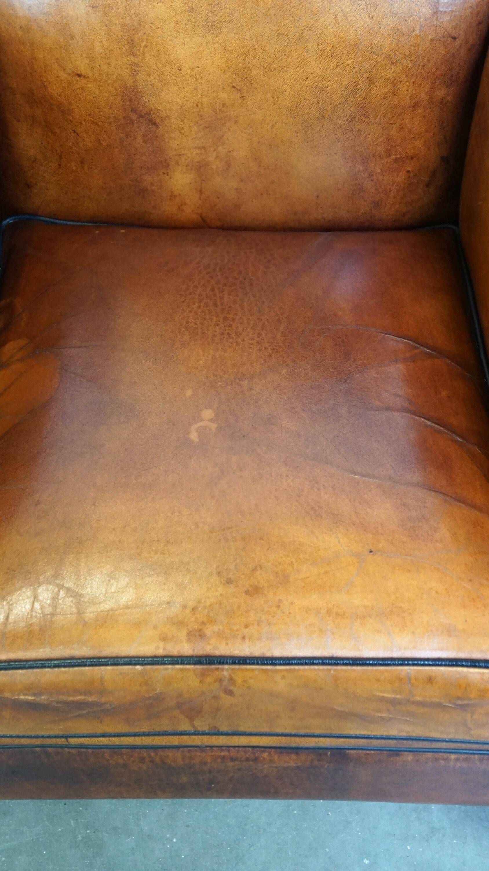 Sleek sheepskin Art Deco design armchair with beautiful details