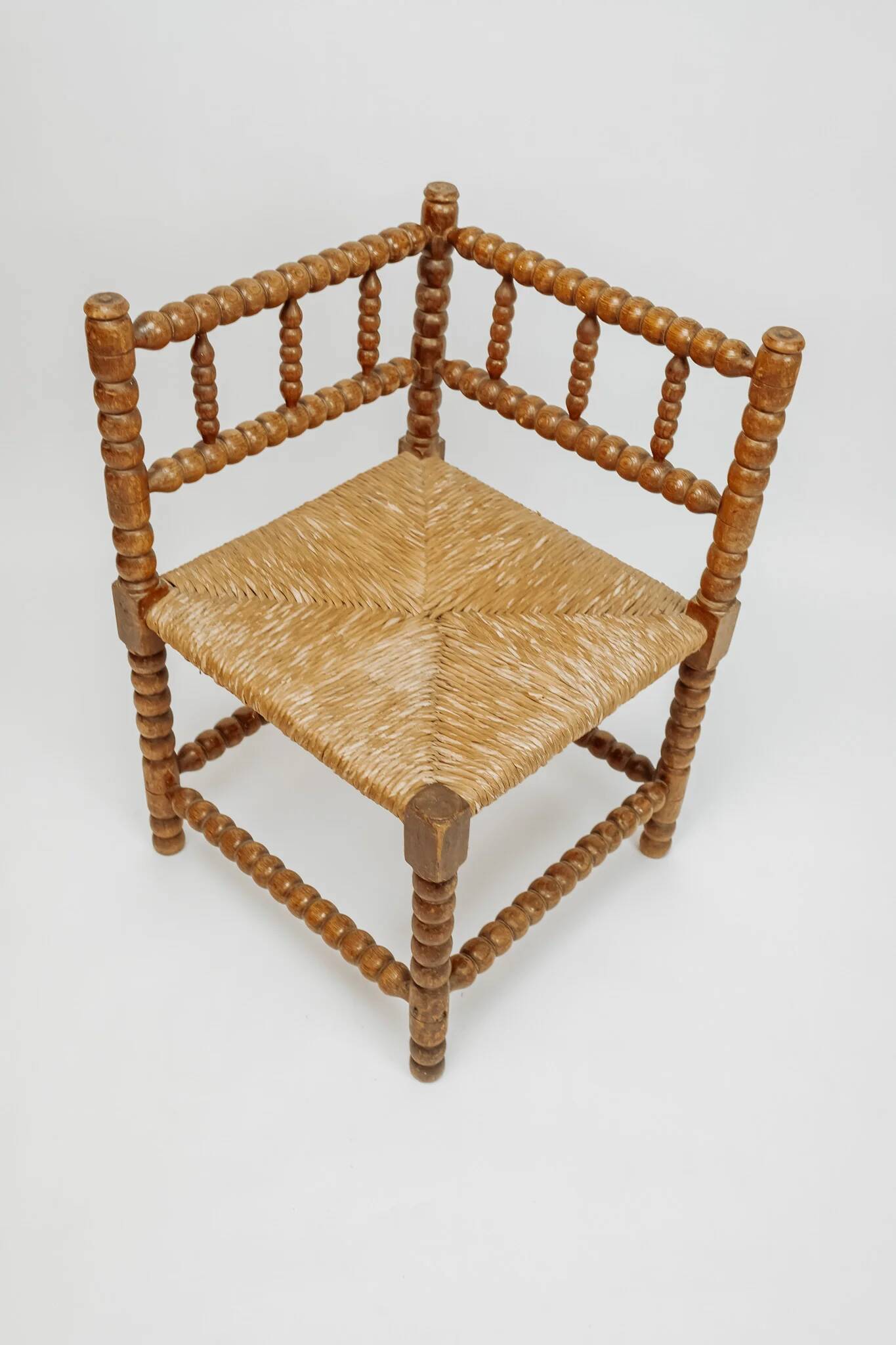 Classic vintage bobbin corner armchair