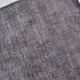 Tapis en laine grise