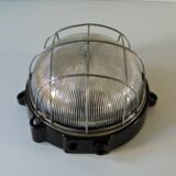 Ceiling lamp in Bakelite and glass.