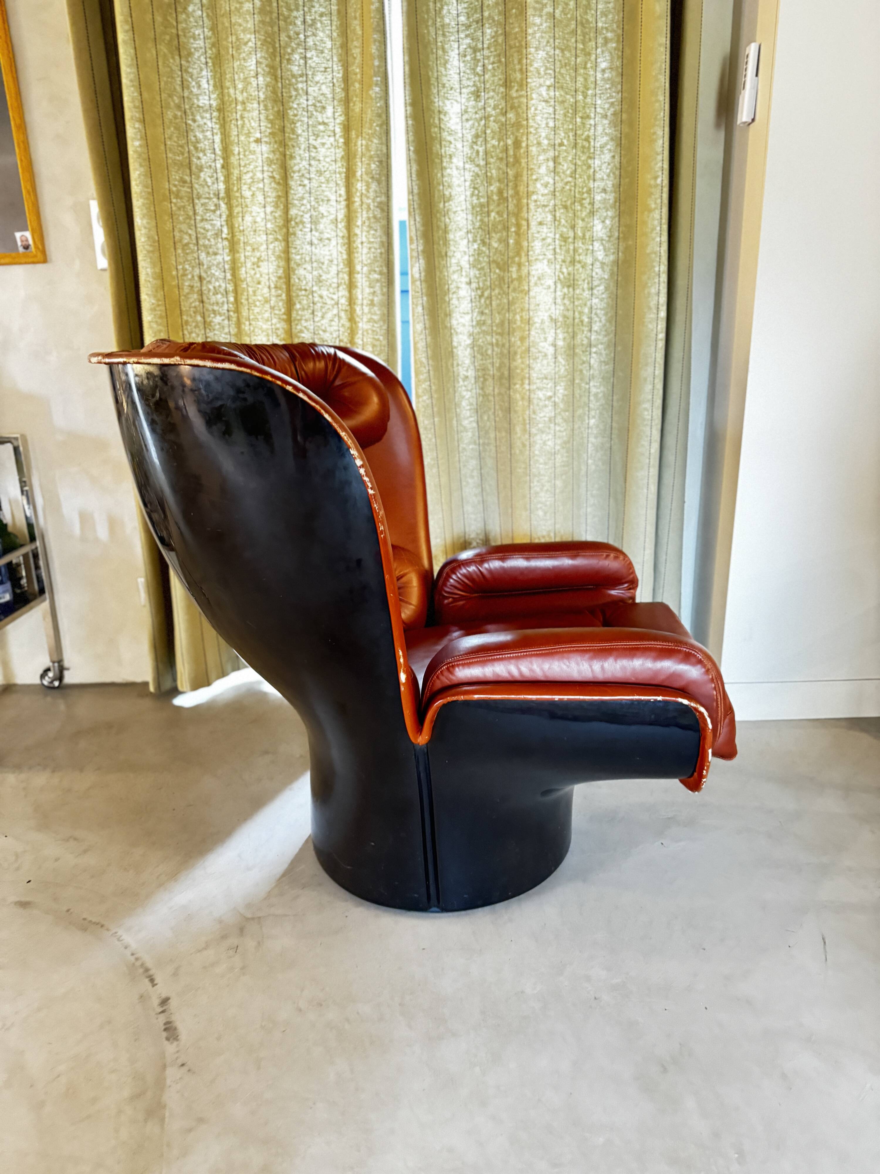 Elda armchair by Joe Colombo, black shell, brown leather