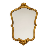 Golden wooden wall mirror in Louis XV style, shell-shaped rocaille decoration, circa