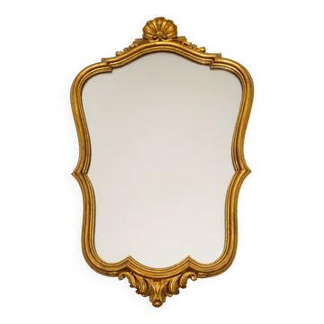 Golden wooden wall mirror in Louis XV style, shell-shaped rocaille decoration, circa