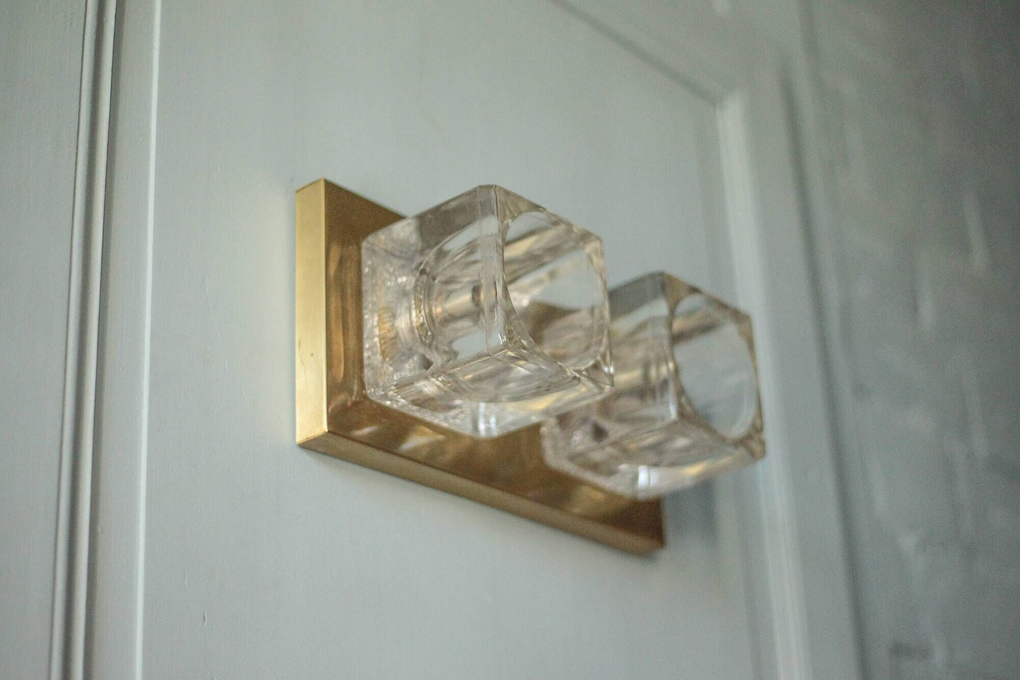 Peill & Putzler wall light, vintage, brass and thick glass wall sconce.