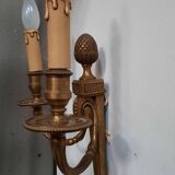 Pair of Louis XVI style bronze wall lights