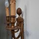 Pair of Louis XVI style bronze wall lights