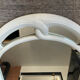 Vintage Art Deco style mirror in stained white wood.