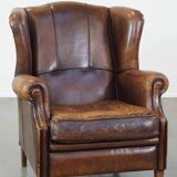 Sheep leather wing chair with patina