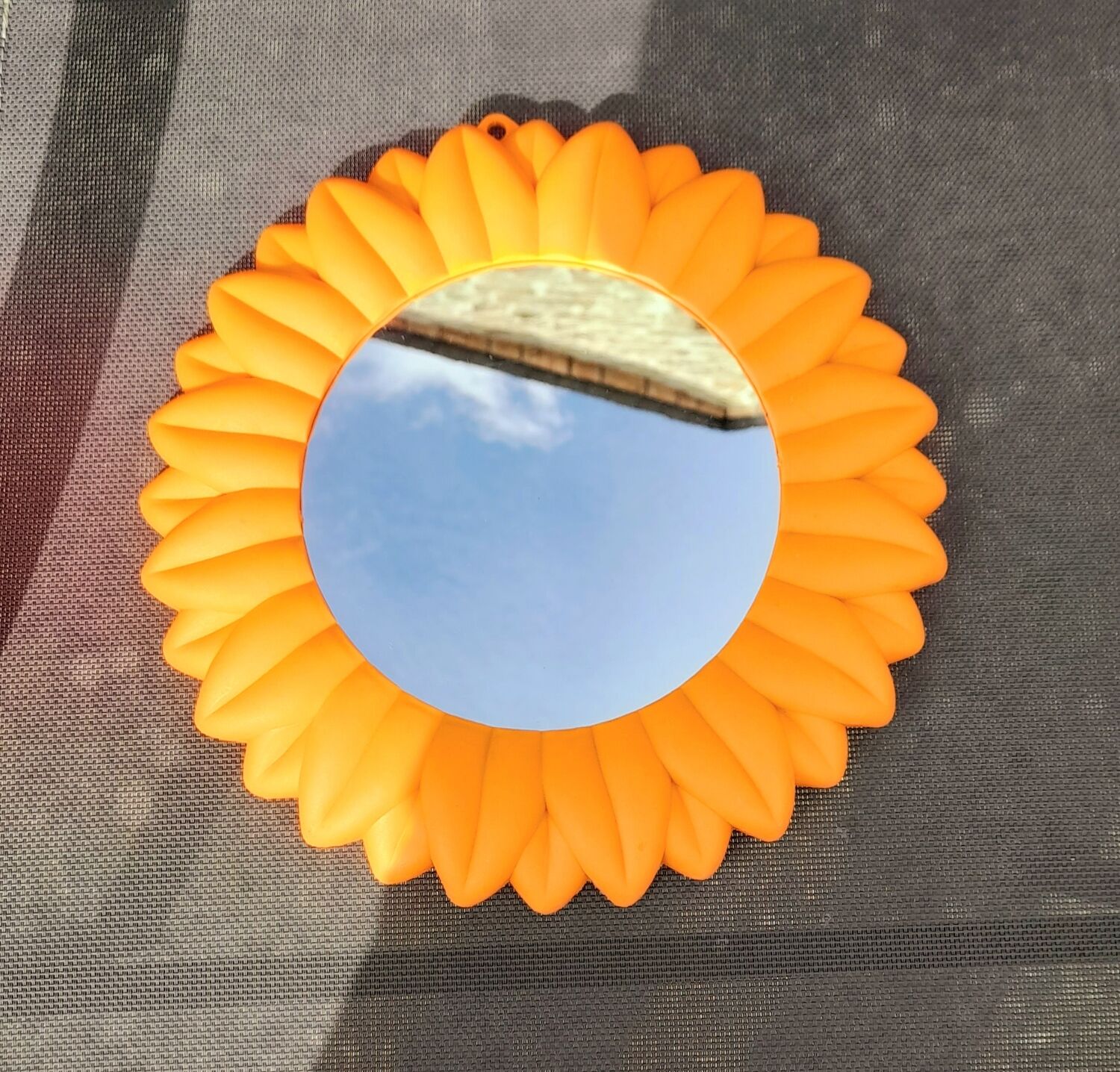 Plastic sun mirror 70s