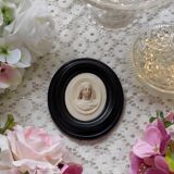 Limestone virgin medallion