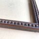 Wooden frame carved in beads, glazed, gray cardboard back and irzft paper