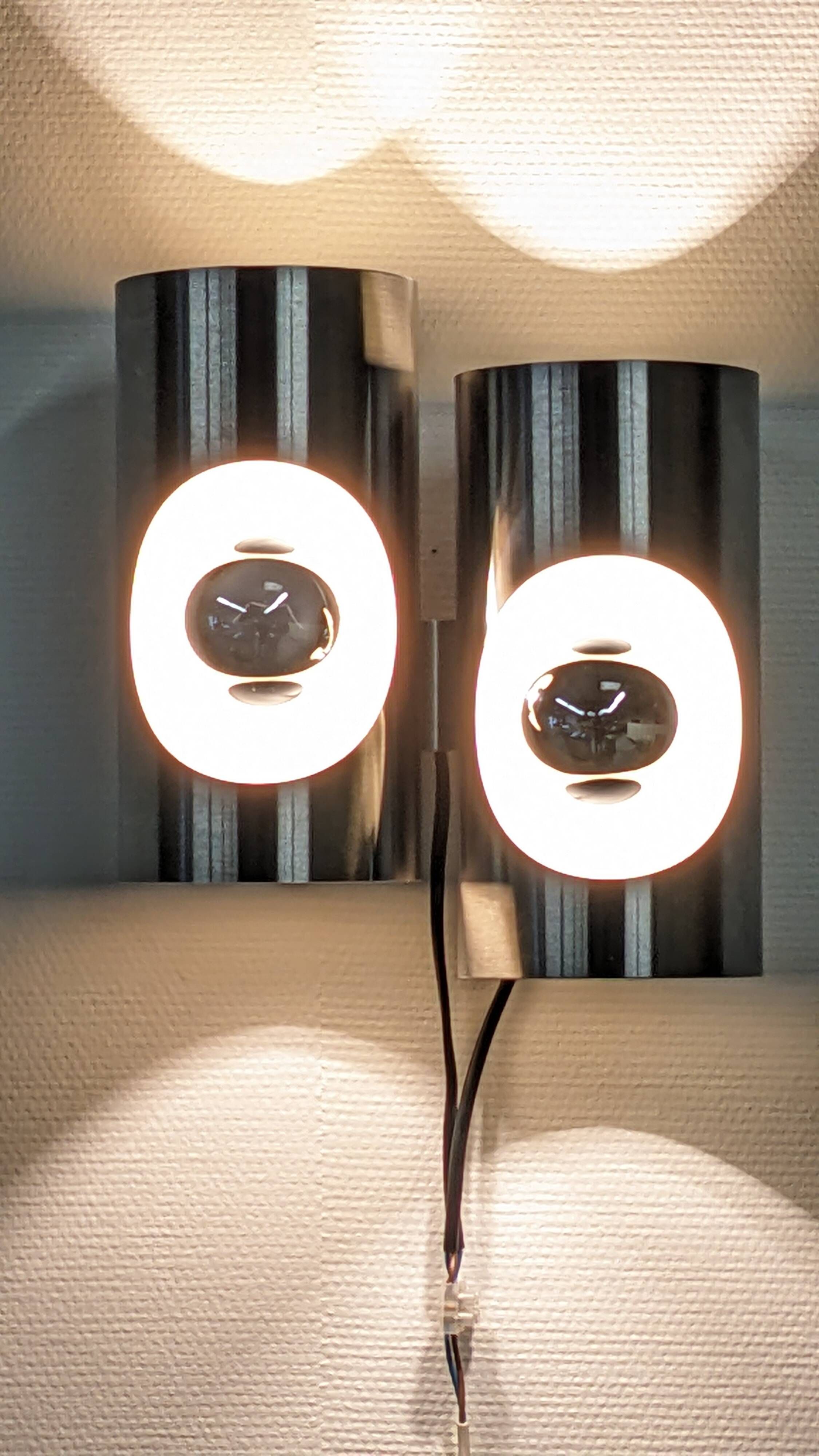 Pair of Space Age double pipe wall lights by Oxar France, 1960s-70s