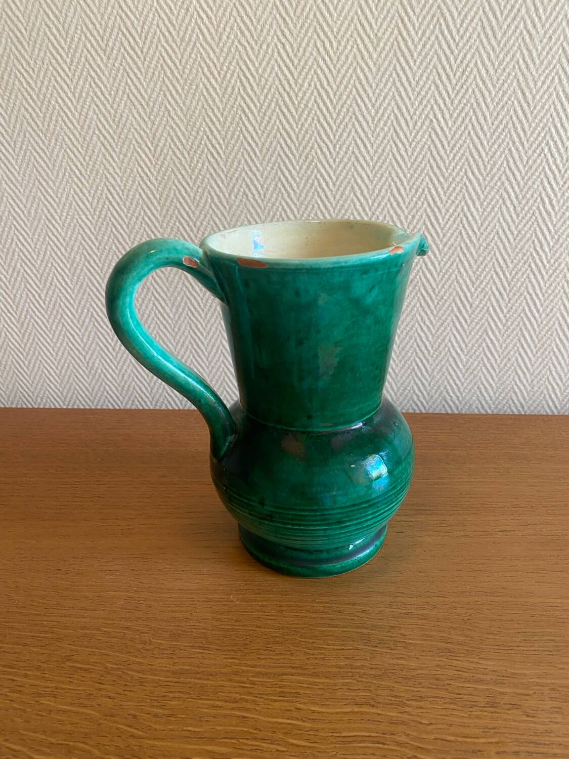 Green glazed ceramic carafe