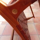 PAIR OF TEAK AND LEATHER ARMCHAIRS