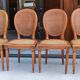 Série de 4 chaises médaillons cannées style Louis XVI