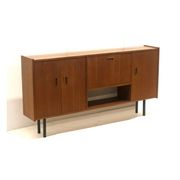 Vintage sideboard cabinet with beautiful handles on metal legs