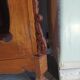 Large glass and carved cabinet
