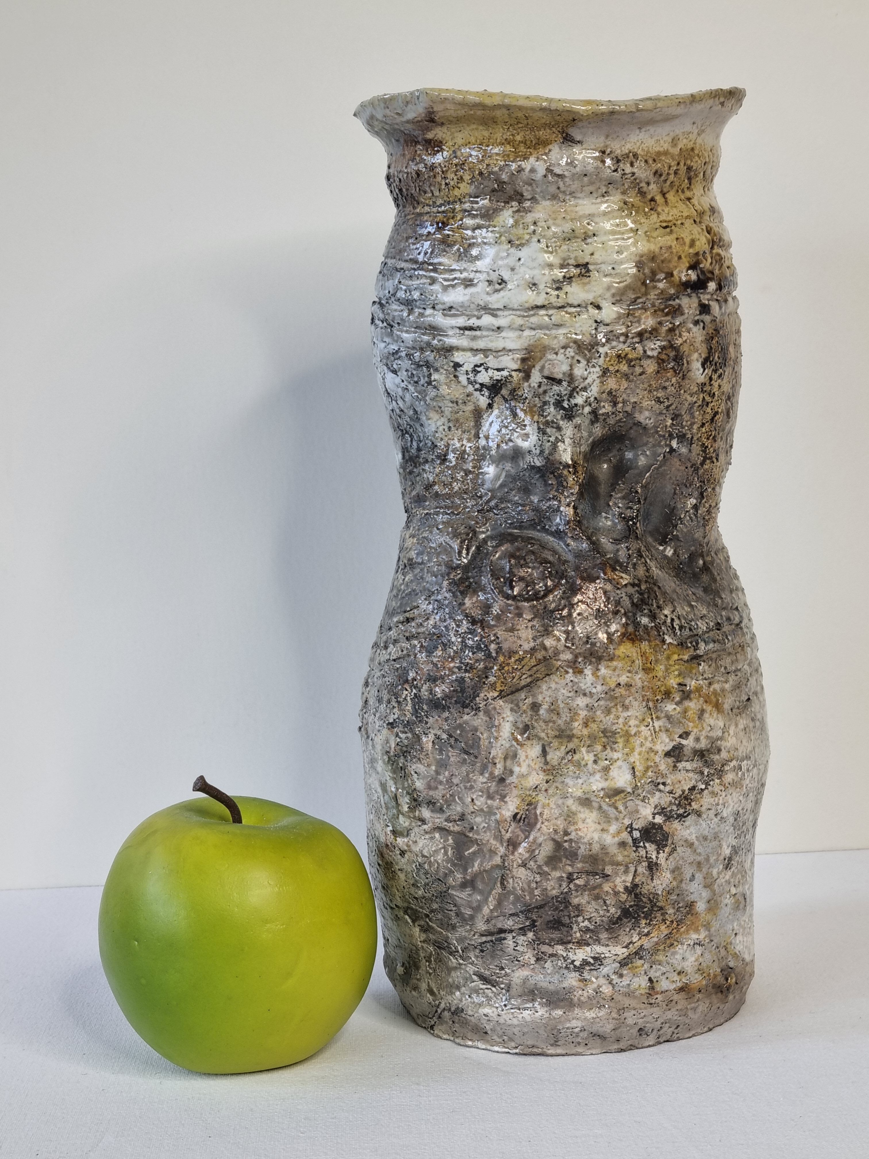 Enamelled ceramic roll vase