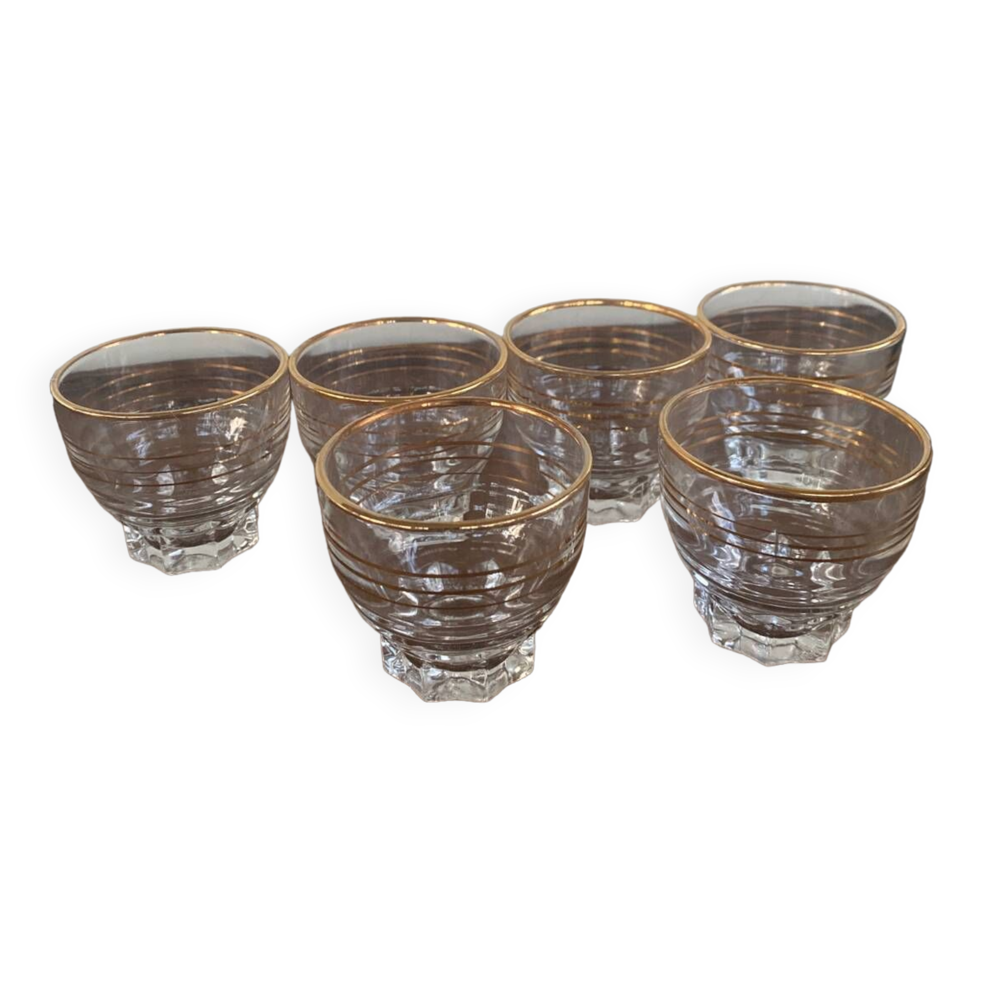 6 small golden glasses