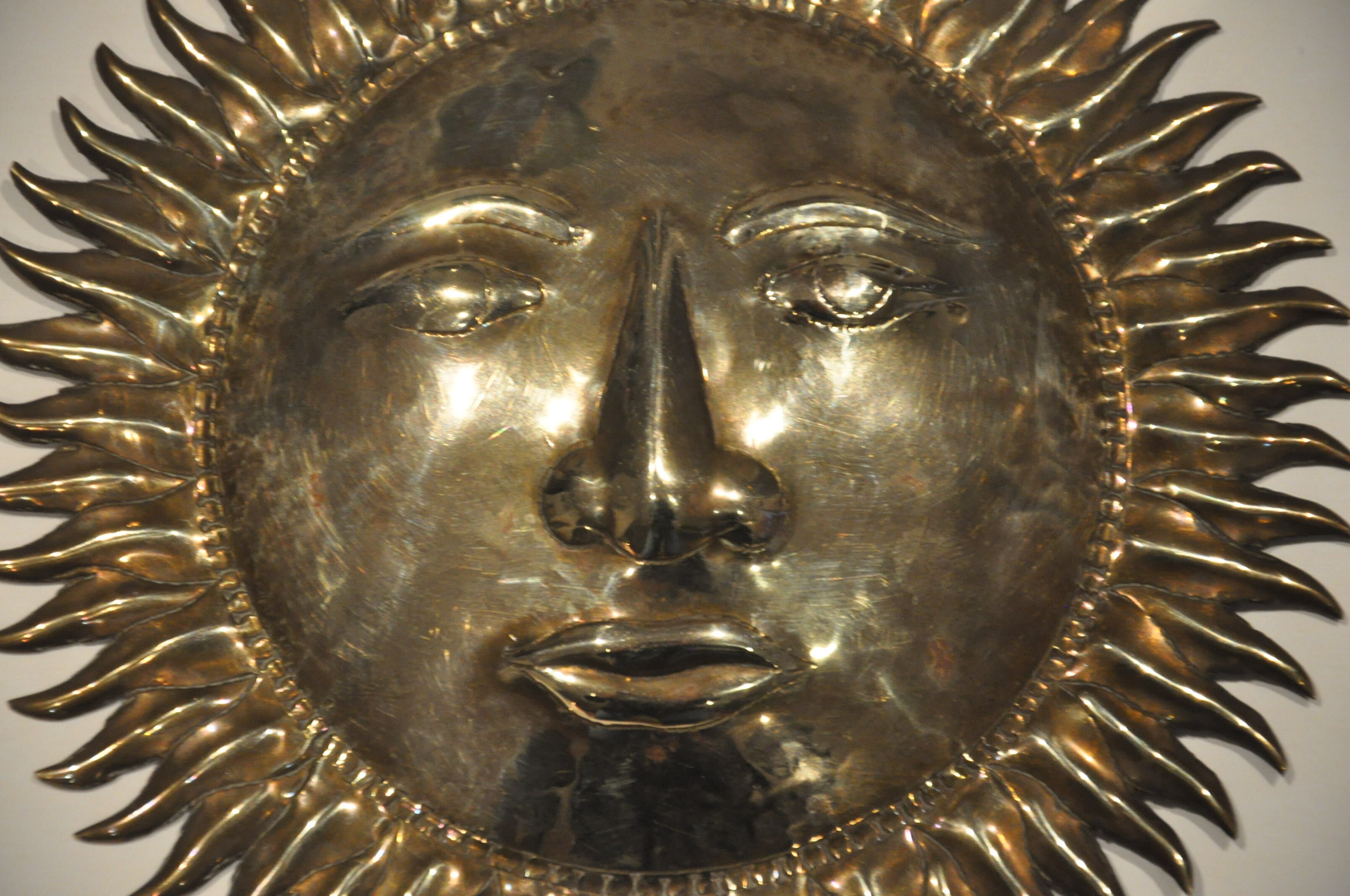 Vintage brass sun