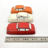 3 old small tin circuit cars with lead wheels • Vintage • 1960s