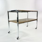 Table on wheels, laminate top and metal Eiffel legs, circa 1950
