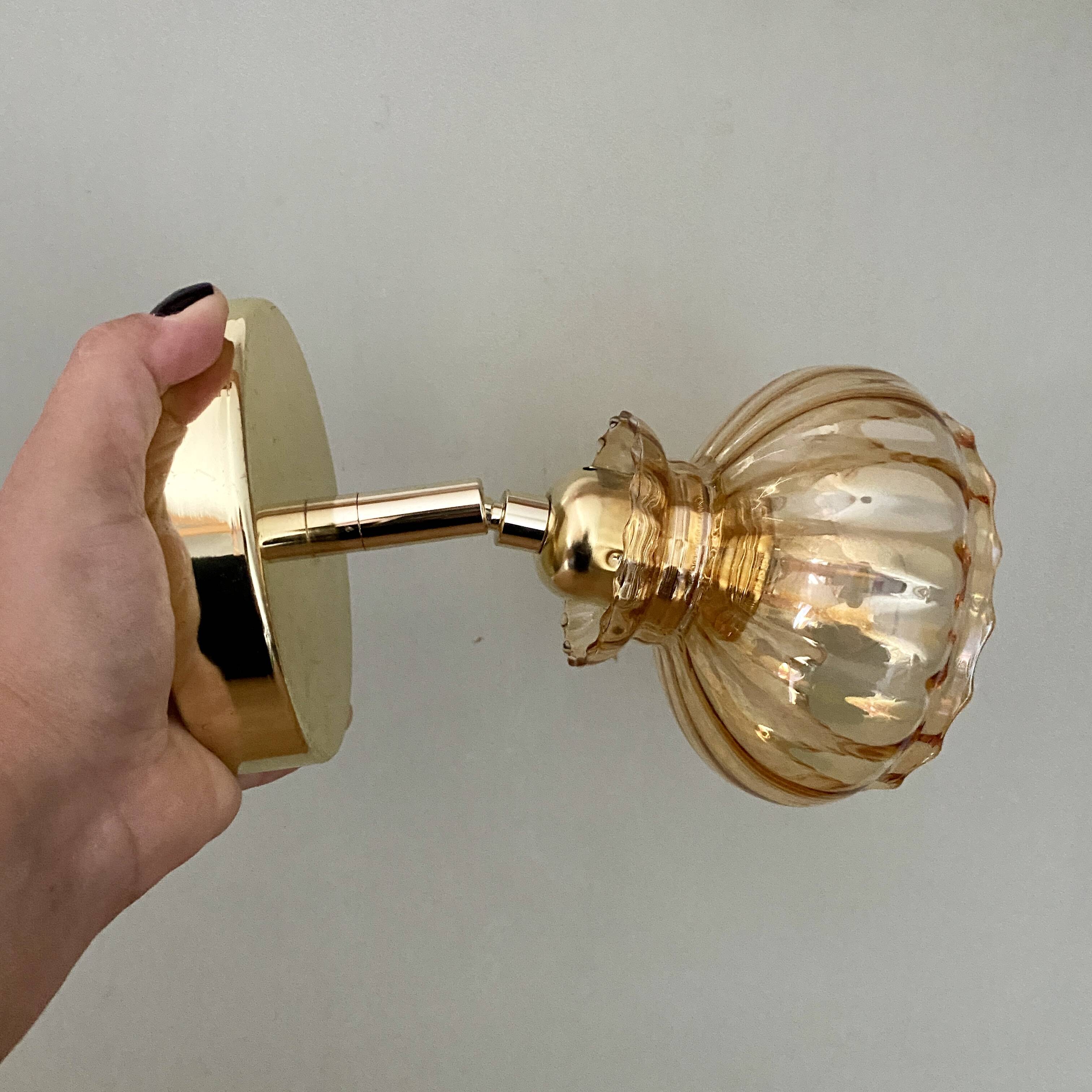 Vintage amber glass globe wall light