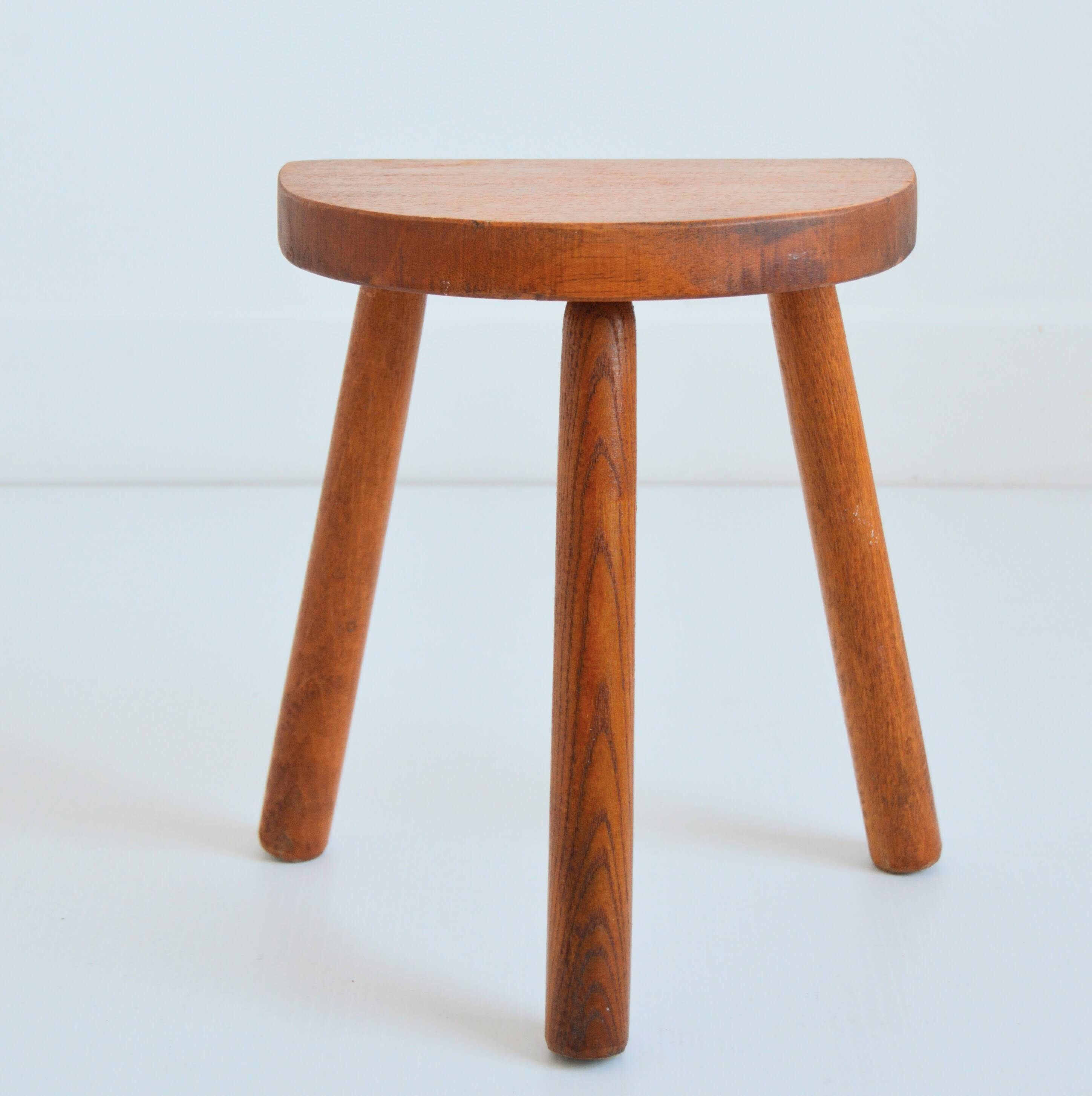 Antique brutalist wooden stool