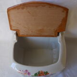Saltbox in earthenware flowers cover wood