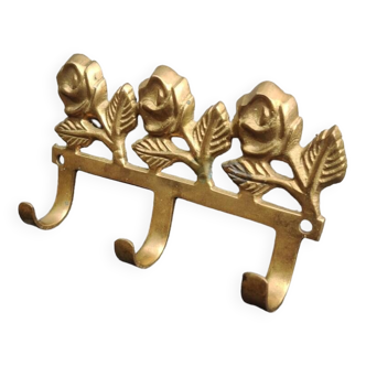 Pretty wall hanging key holder in golden brass