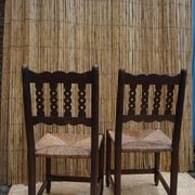 Pair of antique straw-seated farm chairs