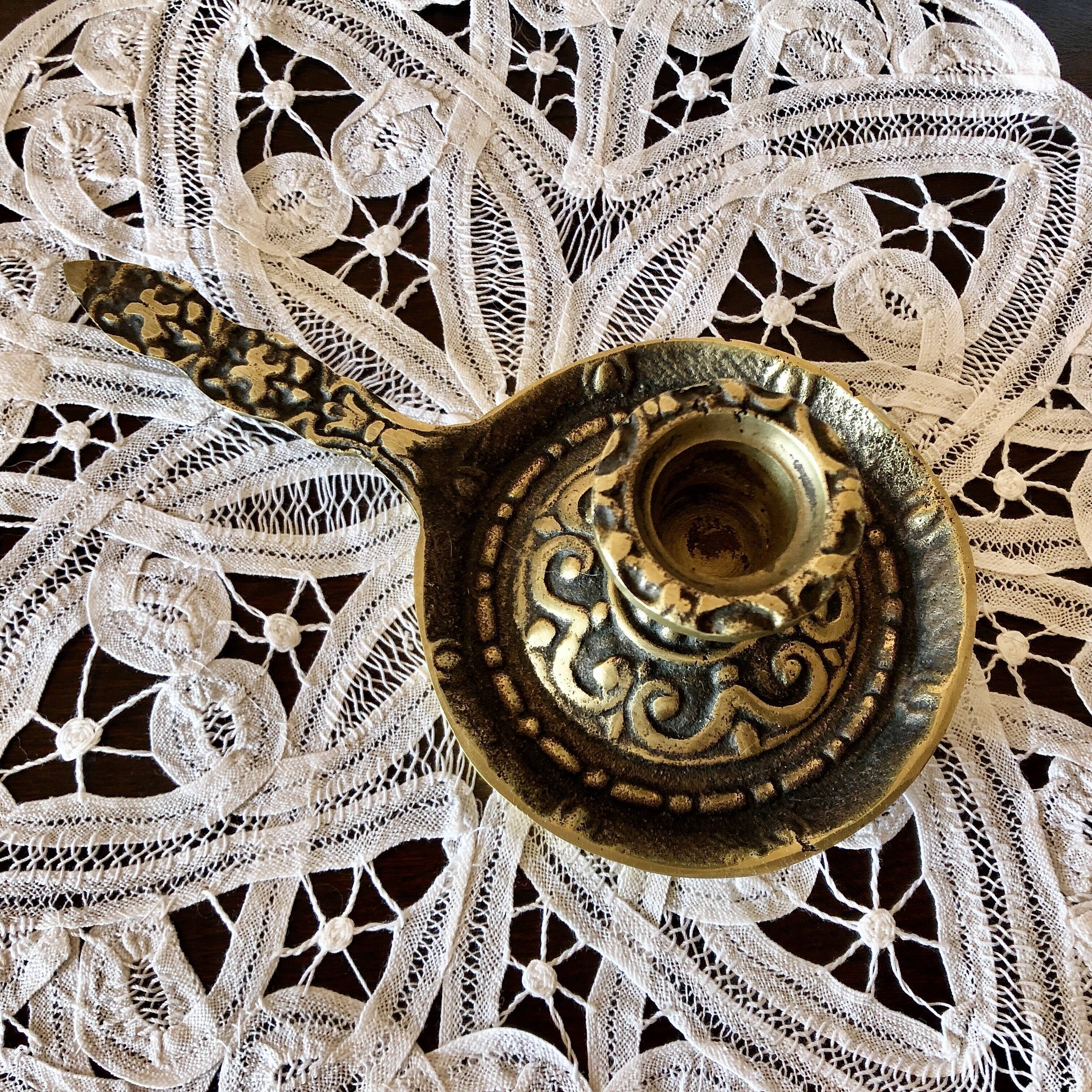 Hand candle holder medieval style solid brass twentieth century