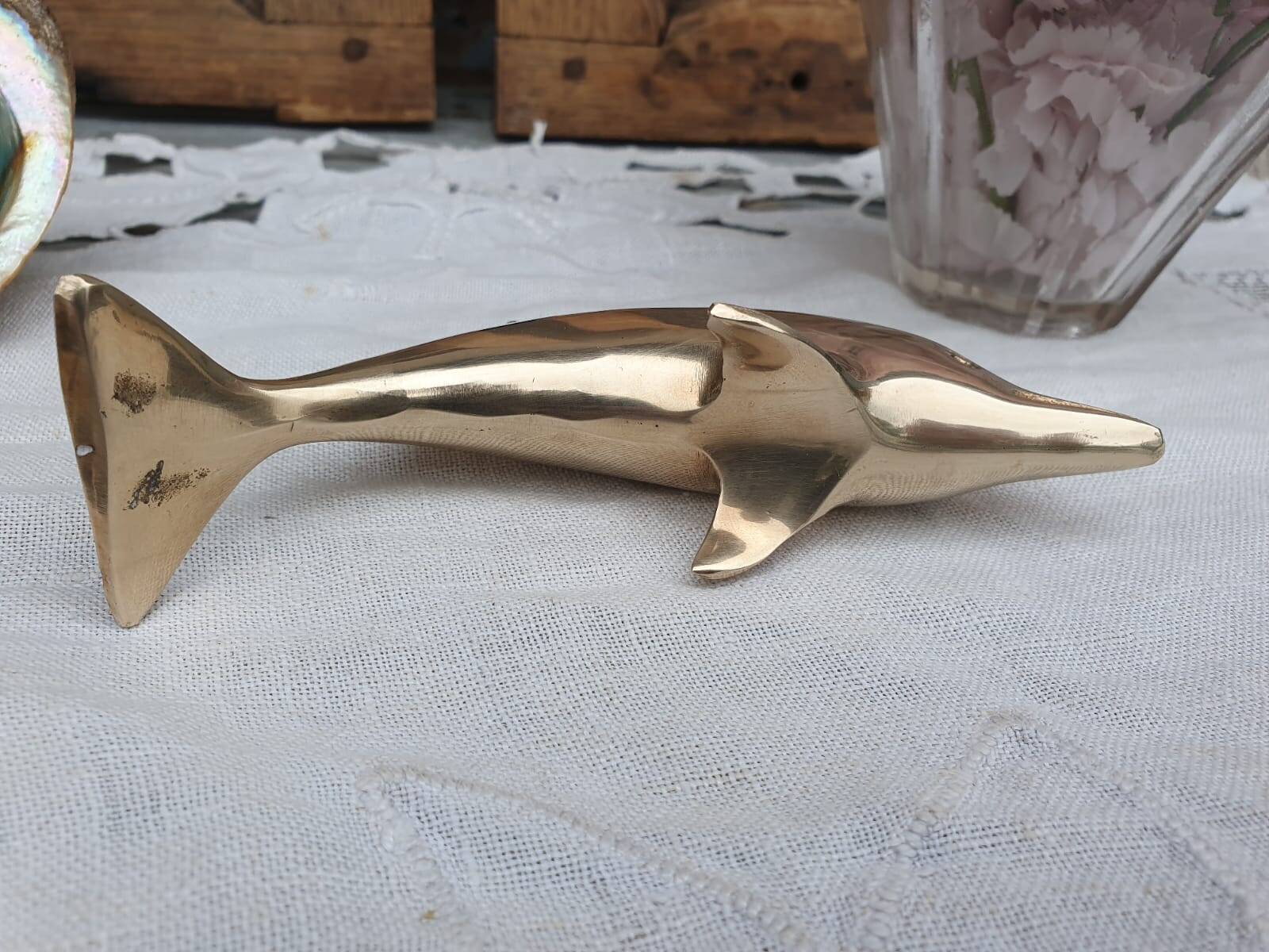 brass dolphin