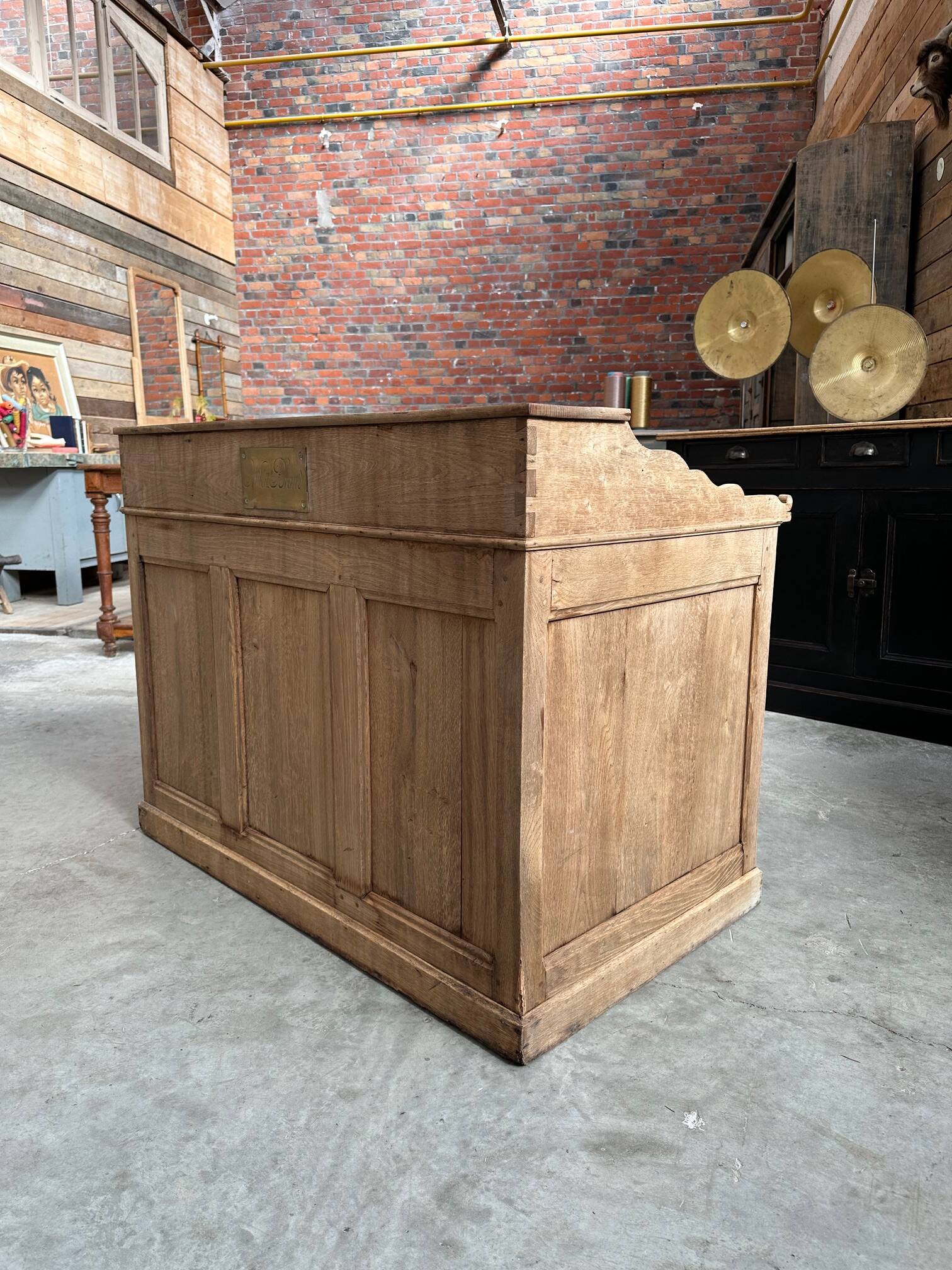 Solid oak reception desk, early 20th century