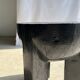 Black mango wood tripod side table with a semi-spherical top, height: 45 cm, diameter: 44 cm.