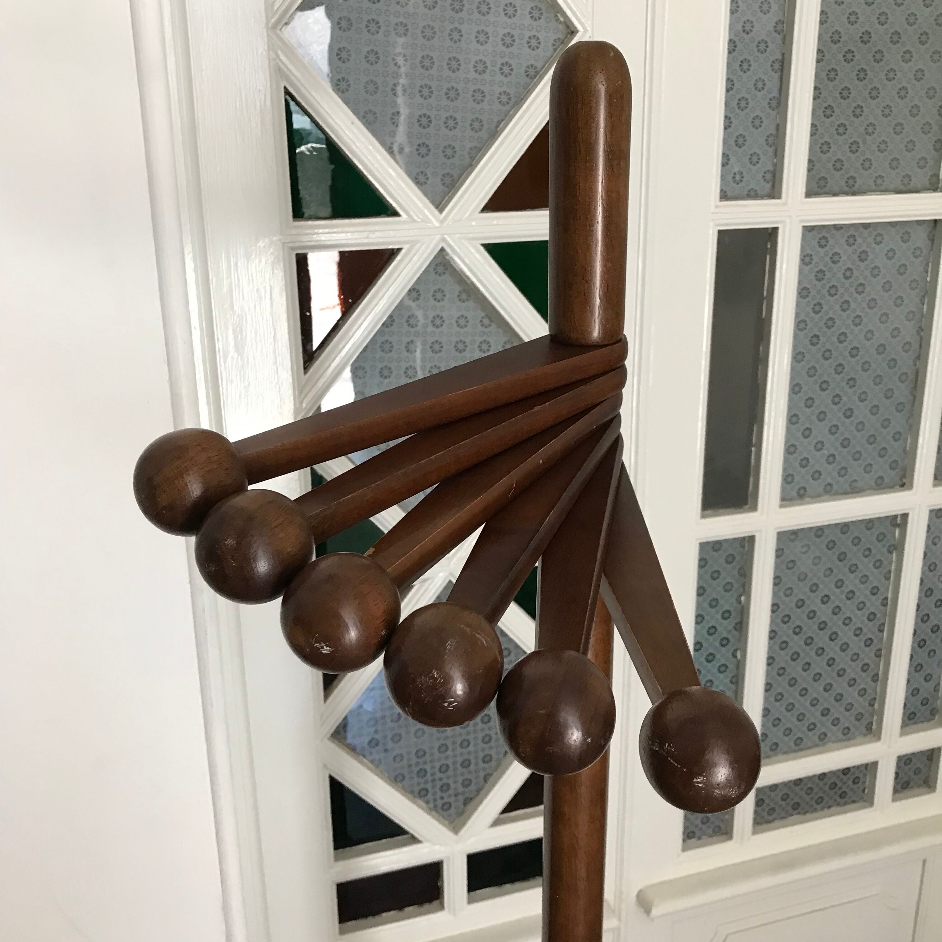 Wooden coat rack on foot