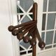 Wooden coat rack on foot