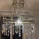 Patinated iron chandelier with pendants, romantic / shabby chic style.