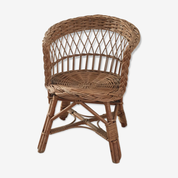 Children's armchair in woven rattan