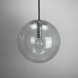 Large suspended lamp with a glass globe featuring bubbles by Peill & Putzler 1970.