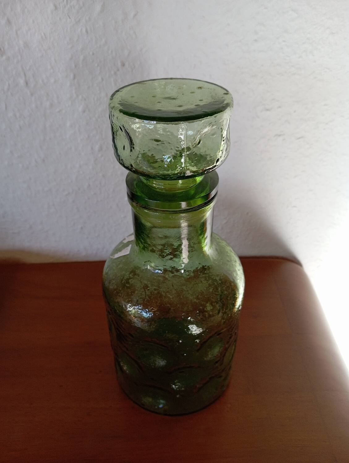 Round relief carafe from the 70s