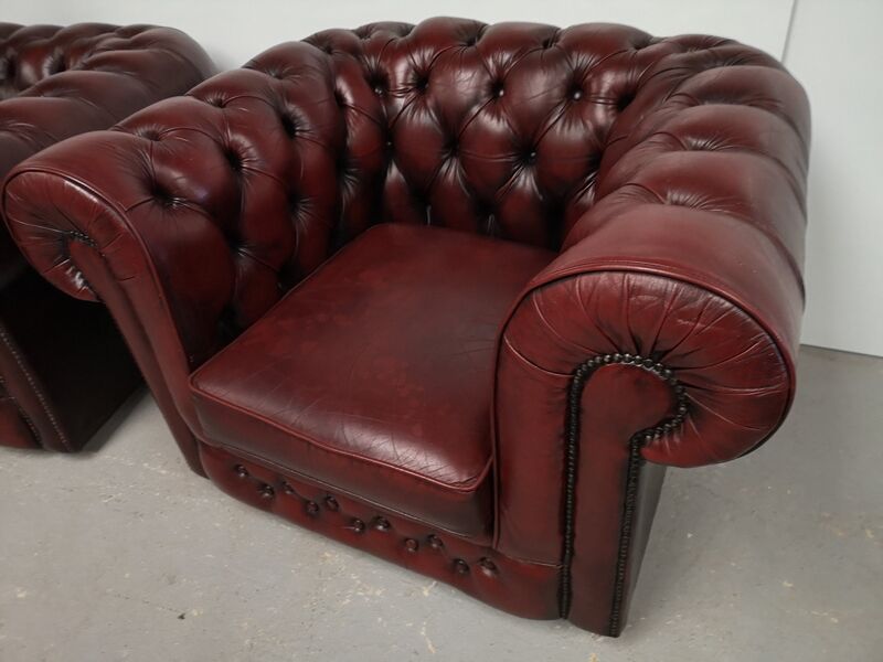Burgundy leather chesterfield chairs