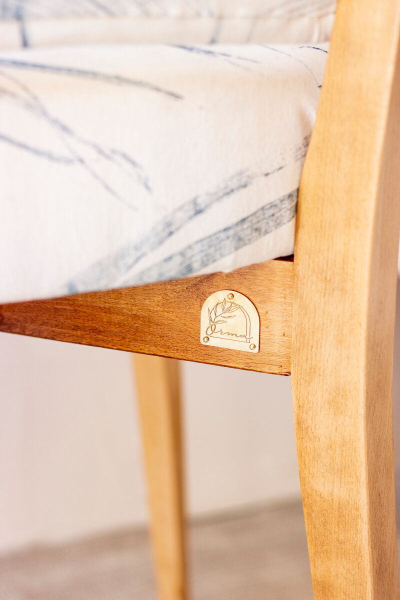 Pair of vintage chairs reupholstered with palm pattern fabric