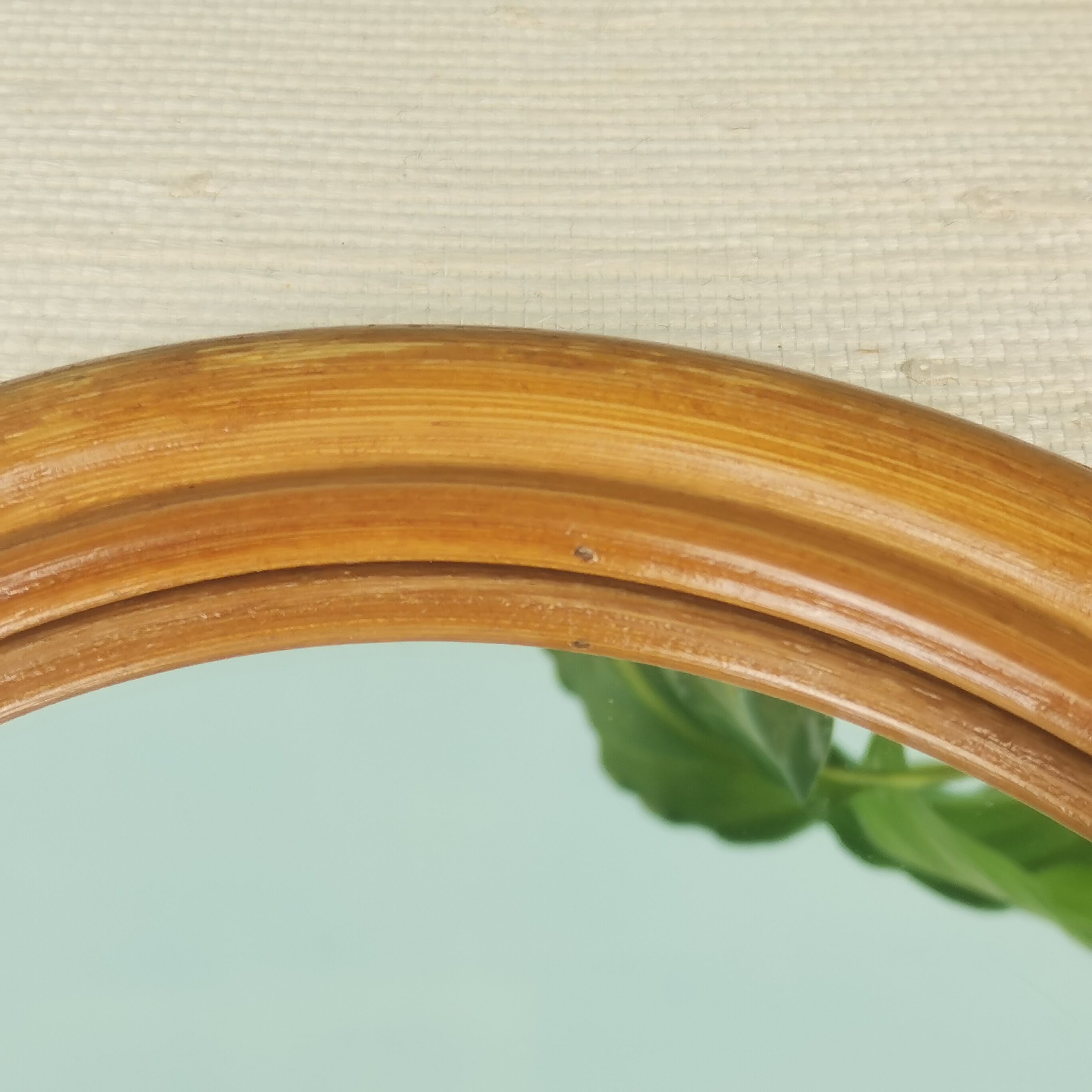 Rattan hand-facing mirror