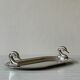 Metal dish with goose head handles serving tray