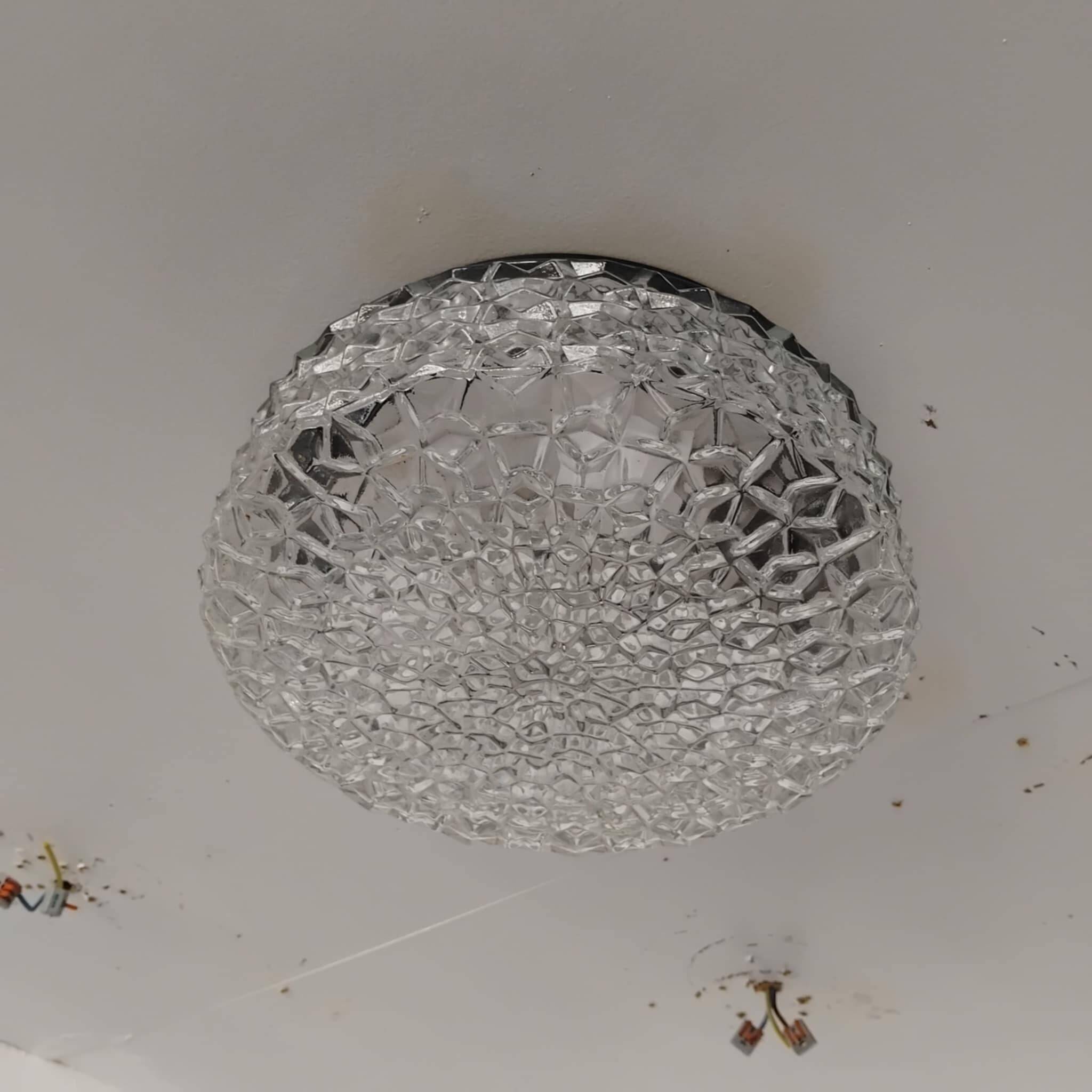 Large round ceiling light in pressed molded glass from the 70s