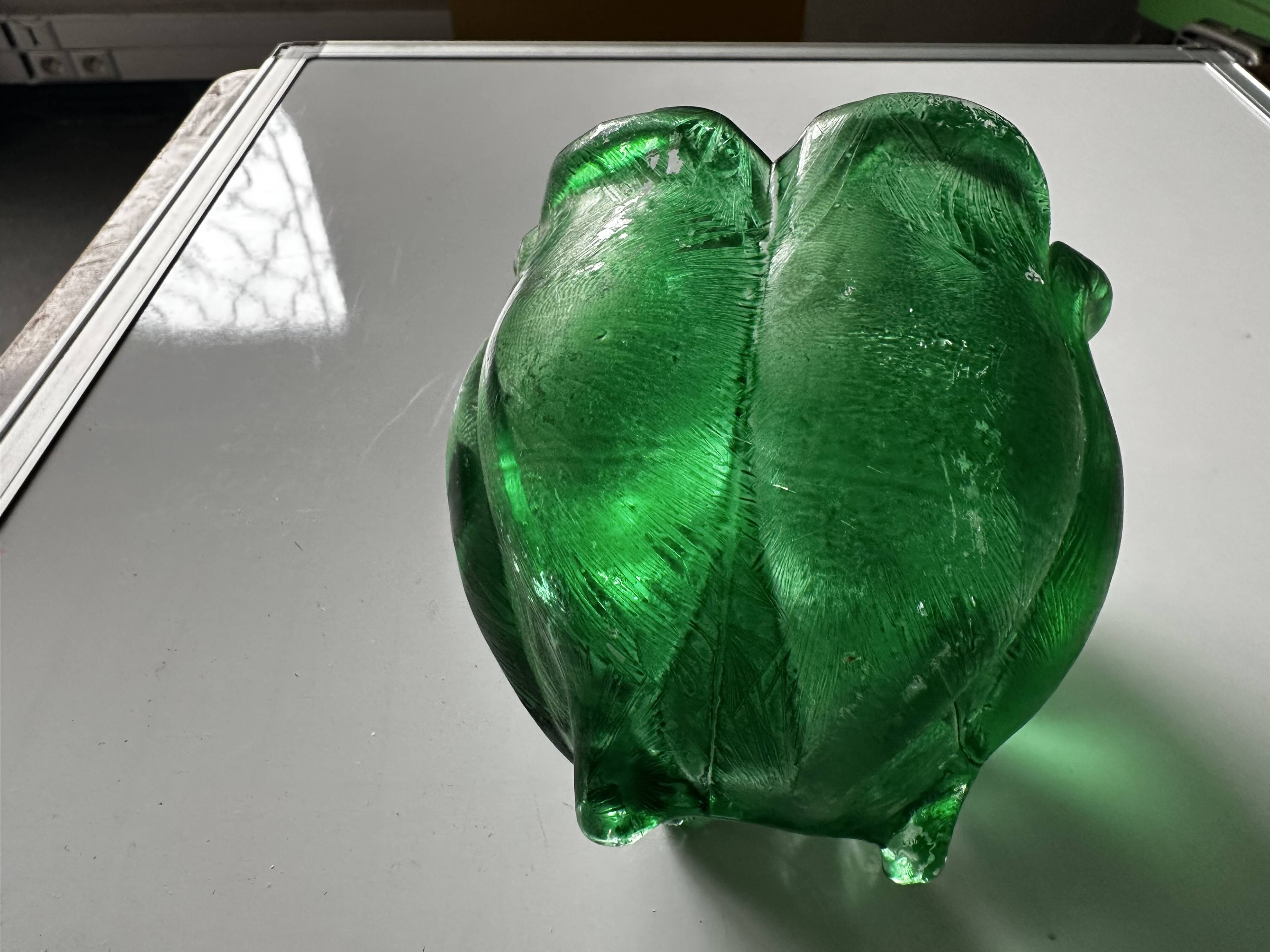 Green glass paste emptying cup from the Art Deco period