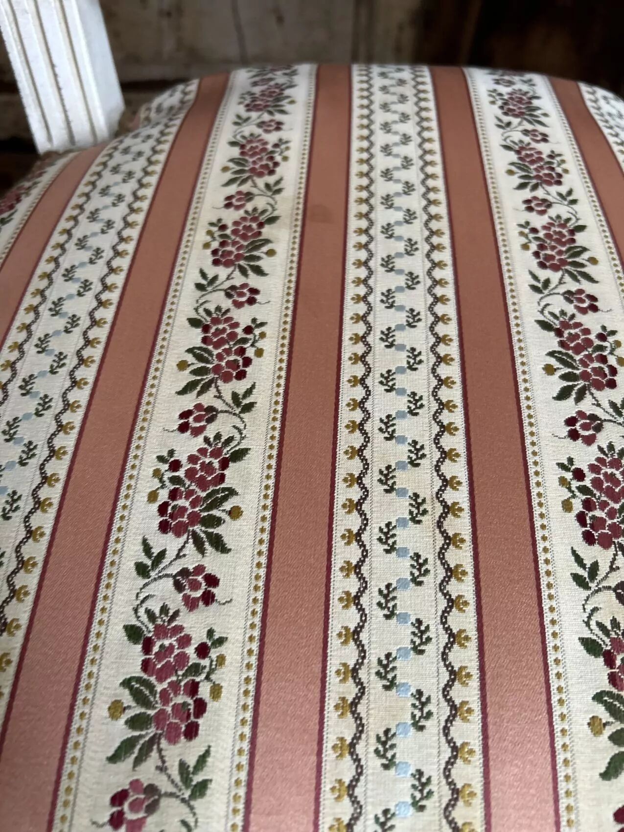 Pair of Louis XVI style chairs in painted wood and satin, classic elegance.