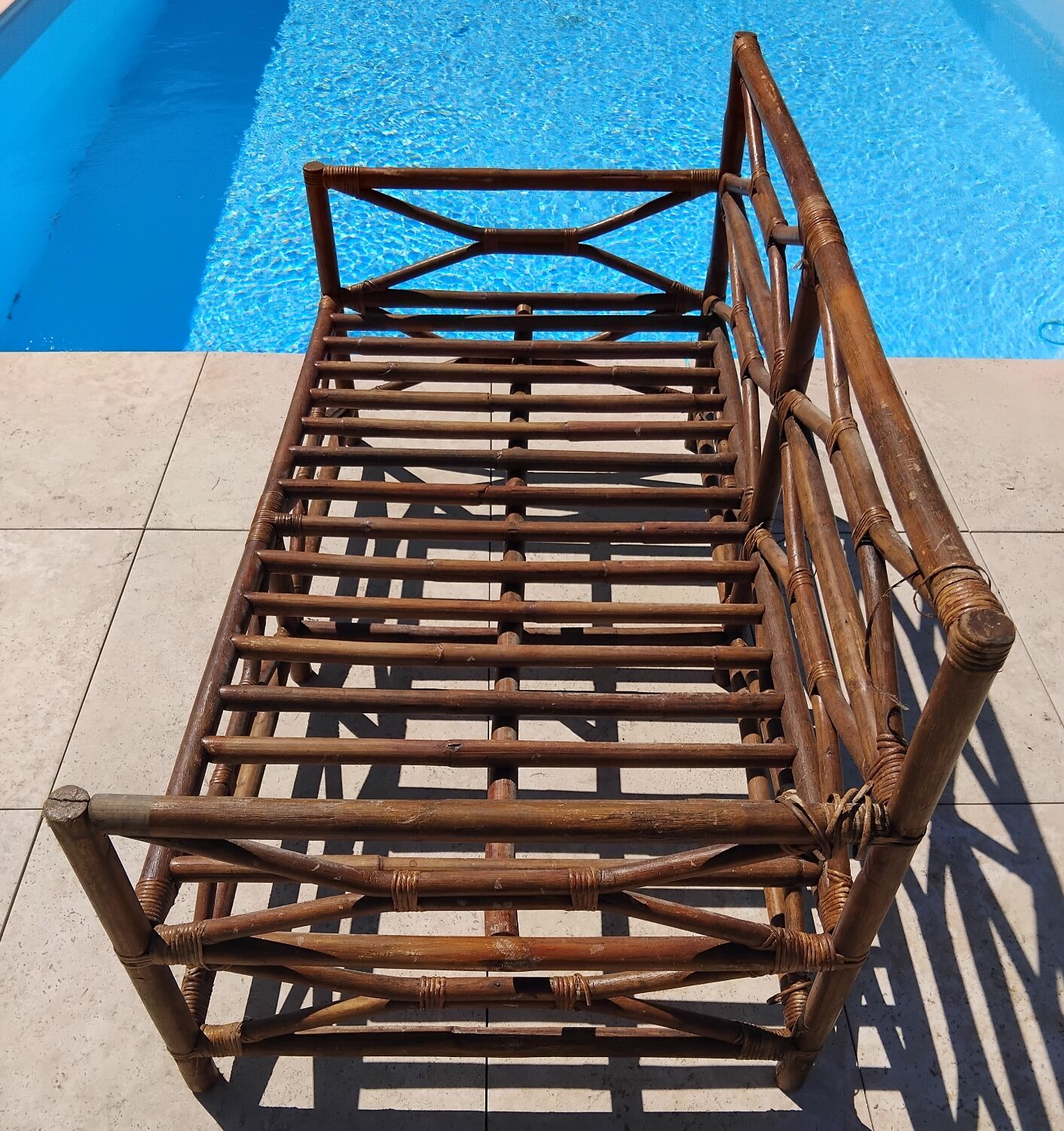 Vintage wooden garden furniture set with a bench and an armchair